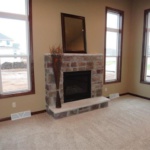 Stone Accented Fireplace (Geranium)